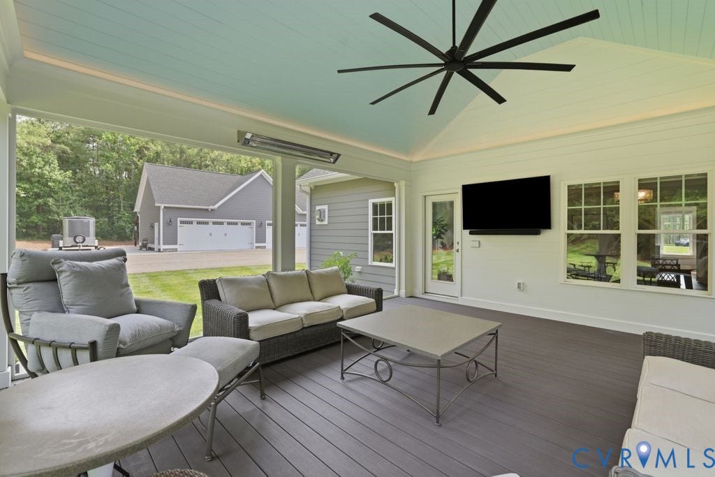 13114 Spring Road, Barr Brook Farms, Rockville, VA 23146 Screened-in porch with a vaulted ceiling, composite flooring, and an overhead fan