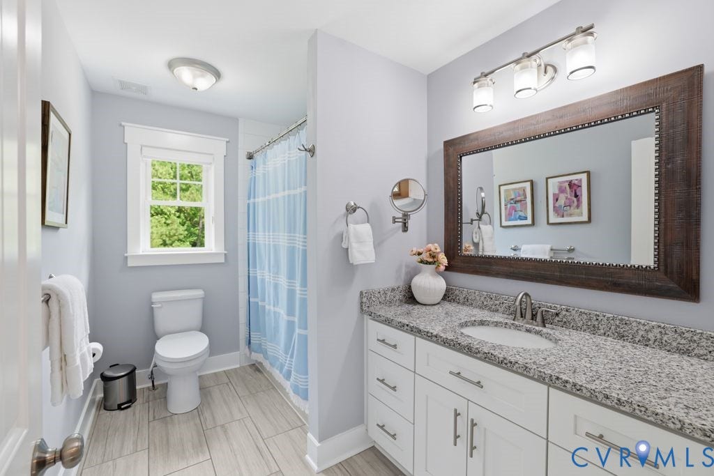 13114 Spring Road, Barr Brook Farms, Rockville, VA 23146 White vanity with granite countertop, undermount sink, and chrome faucet