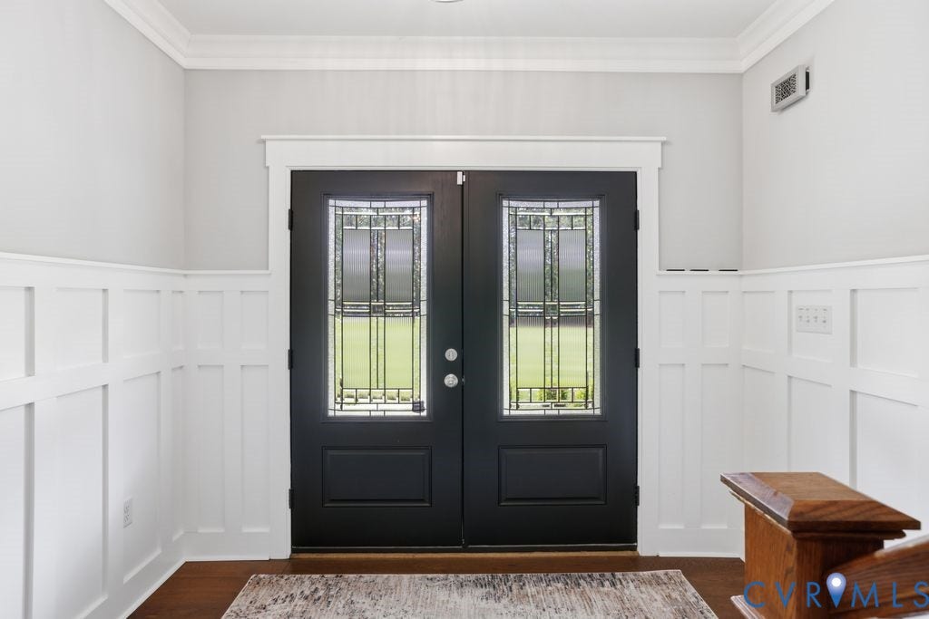 13114 Spring Road, Barr Brook Farms, Rockville, VA 23146 Double entry doors with decorative glass panels, wainscoting, crown molding, and wood-finish flooring