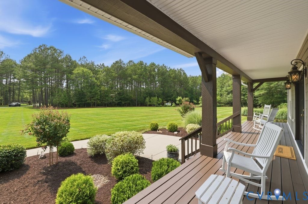 13114 Spring Road, Barr Brook Farms, Rockville, VA 23146 Expansive covered porch with wood-finish decking and dark wood-stained columns