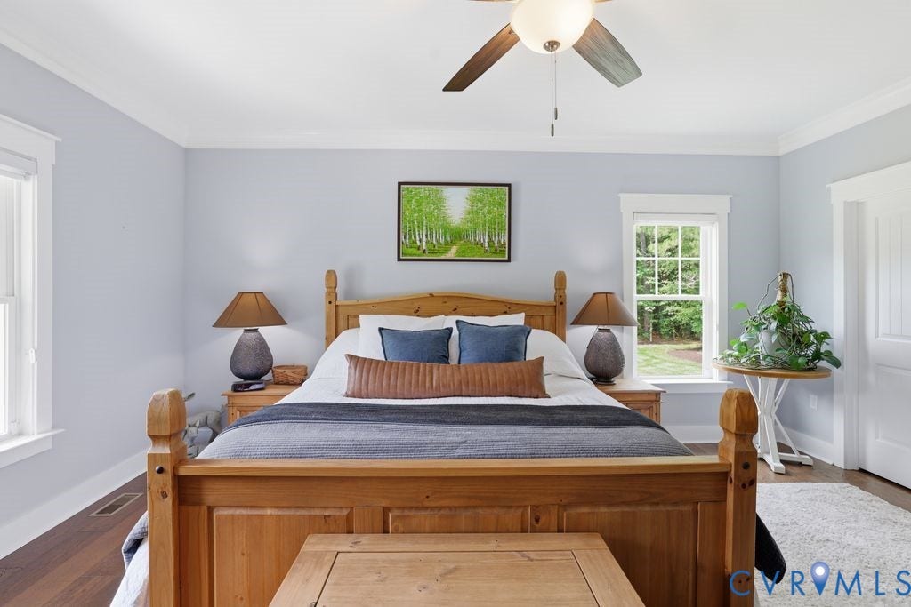 13114 Spring Road, Barr Brook Farms, Rockville, VA 23146 Wood-finish flooring, crown molding, double-hung windows, and a ceiling fan with integrated lighting