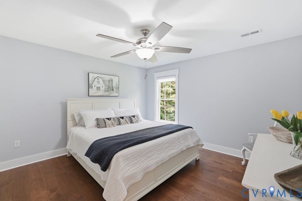 13114 Spring Road, Barr Brook Farms, Rockville, VA 23146 Hardwood-style flooring, white trim, and a ceiling fan with integrated lighting