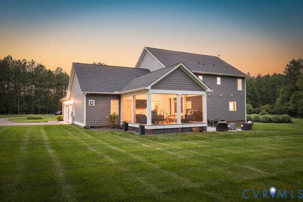 13114 Spring Road, Barr Brook Farms, Rockville, VA 23146 Gable roof lines accent this home with gray siding, featuring a screened porch and an open patio