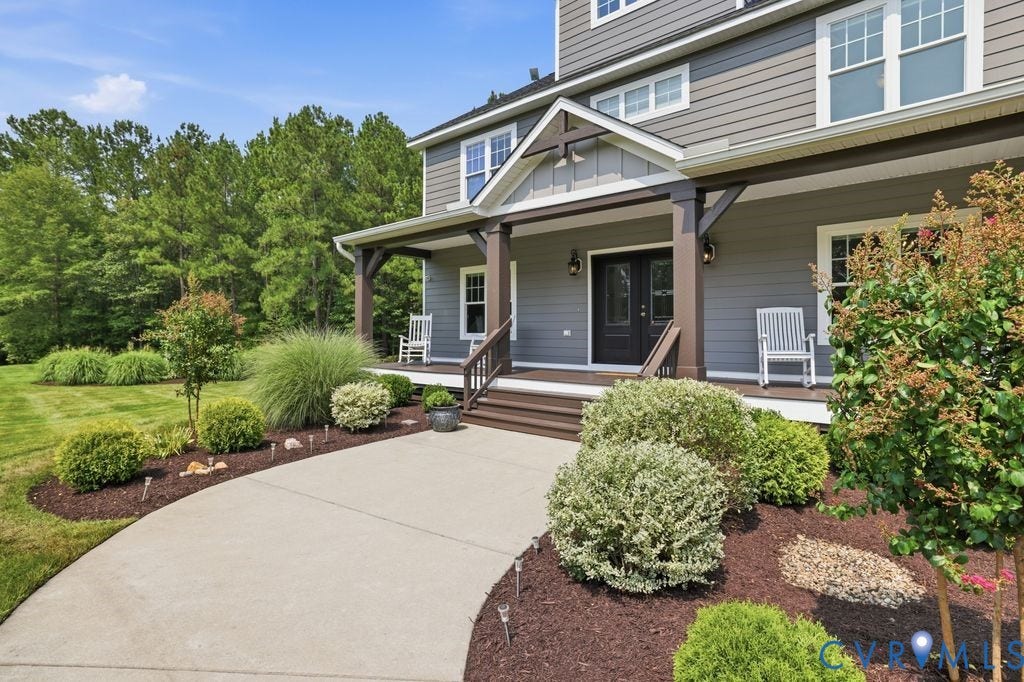 13114 Spring Road, Barr Brook Farms, Rockville, VA 23146 Gray siding exterior with white trim, covered front porch, double entry doors, wood porch columns, and established landscaping