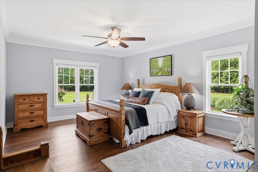 13114 Spring Road, Barr Brook Farms, Rockville, VA 23146 Hardwood flooring, painted walls, crown molding, double windows, and a ceiling fan with light fixture