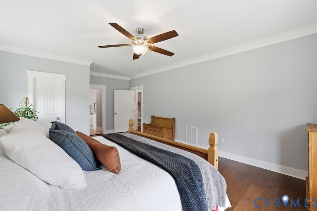 13114 Spring Road, Barr Brook Farms, Rockville, VA 23146 Wood-finish flooring, ceiling fan with integrated lighting, white trim, and a white interior door