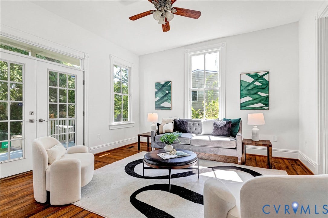 615 N 23rd Street, Church Hill Central, Richmond, VA 23223 Hardwood flooring, white painted walls, ceiling fan, double-hung windows, and French doors