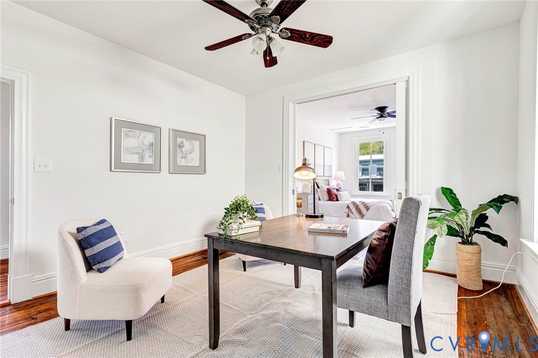 615 N 23rd Street, Church Hill Central, Richmond, VA 23223 Wood-finish flooring, white walls, and a ceiling fan with light fixture