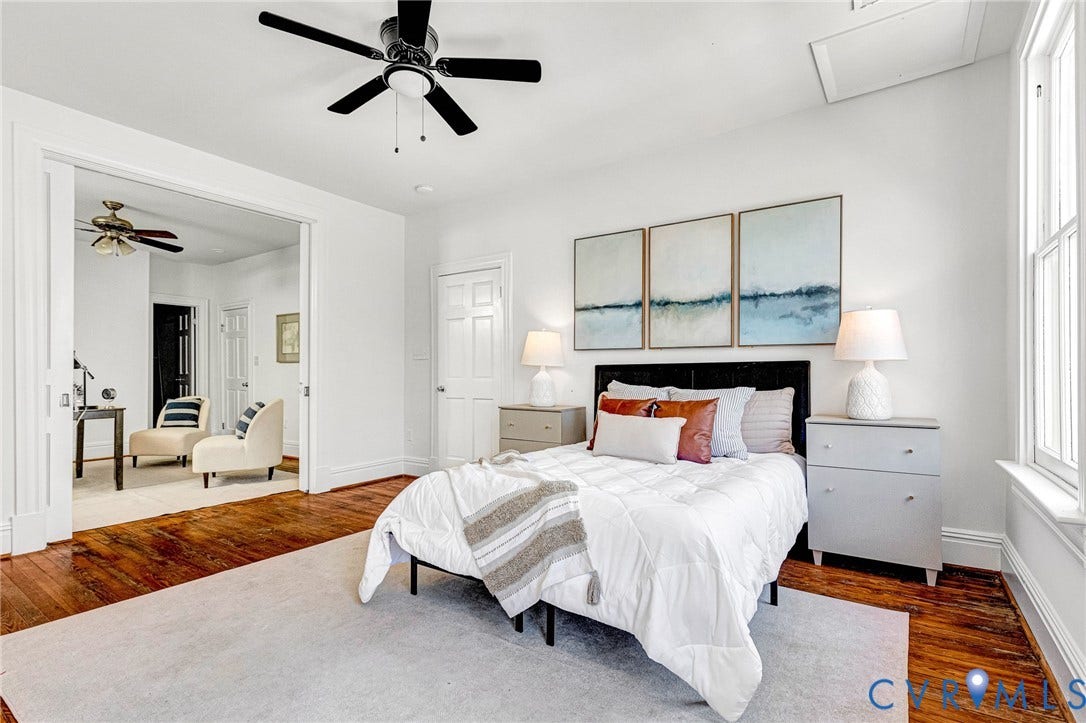615 N 23rd Street, Church Hill Central, Richmond, VA 23223 Hardwood flooring, painted trim, and a ceiling fan