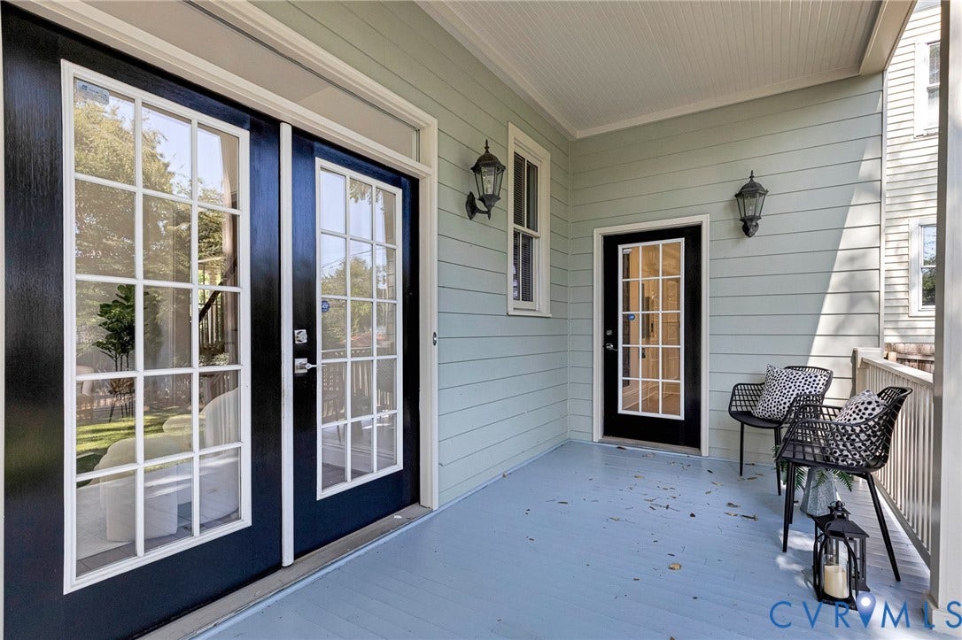 615 N 23rd Street, Church Hill Central, Richmond, VA 23223 Covered porch with light blue siding
