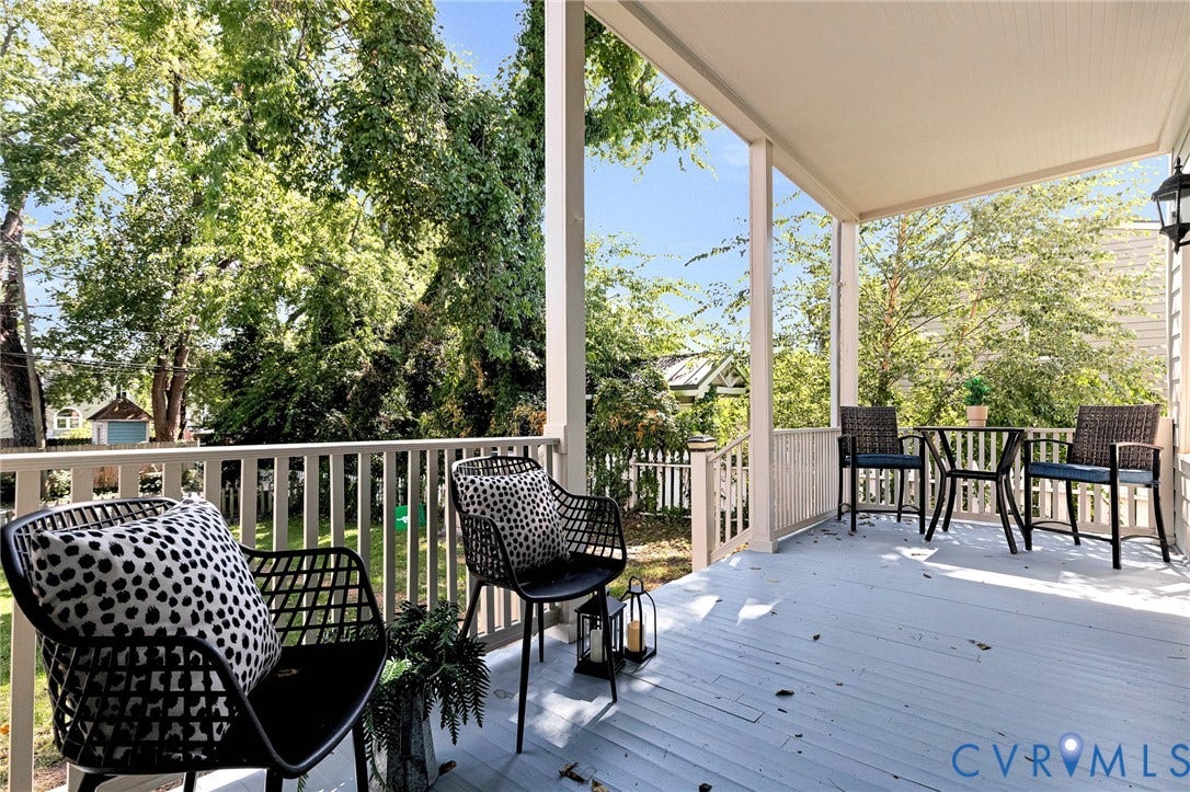615 N 23rd Street, Church Hill Central, Richmond, VA 23223 Covered porch with painted wood flooring and white spindle railings