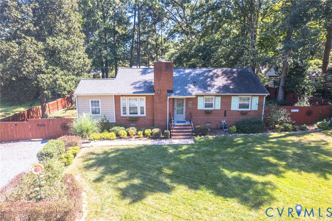 3353 Warner Road, Stratford Hills, Richmond, VA 23225 Brick exterior with siding accents, mature landscaping, and a well-maintained lawn