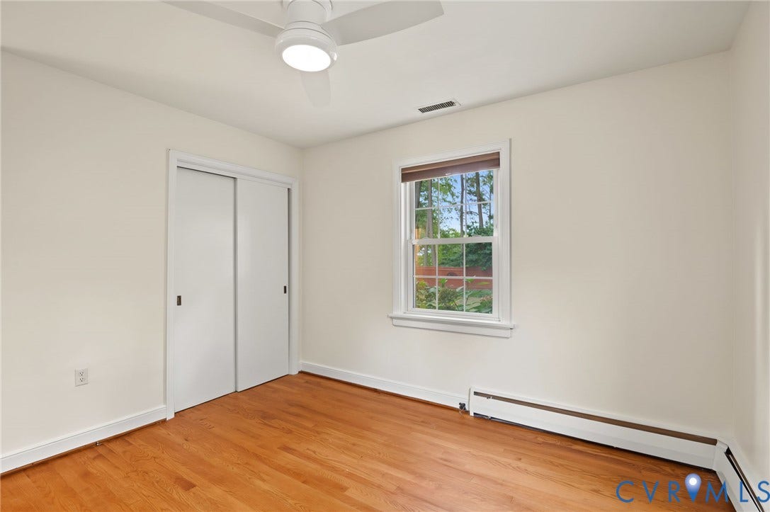 3353 Warner Road, Stratford Hills, Richmond, VA 23225 Hardwood flooring, sliding closet doors, single window, ceiling fan, and baseboard heating