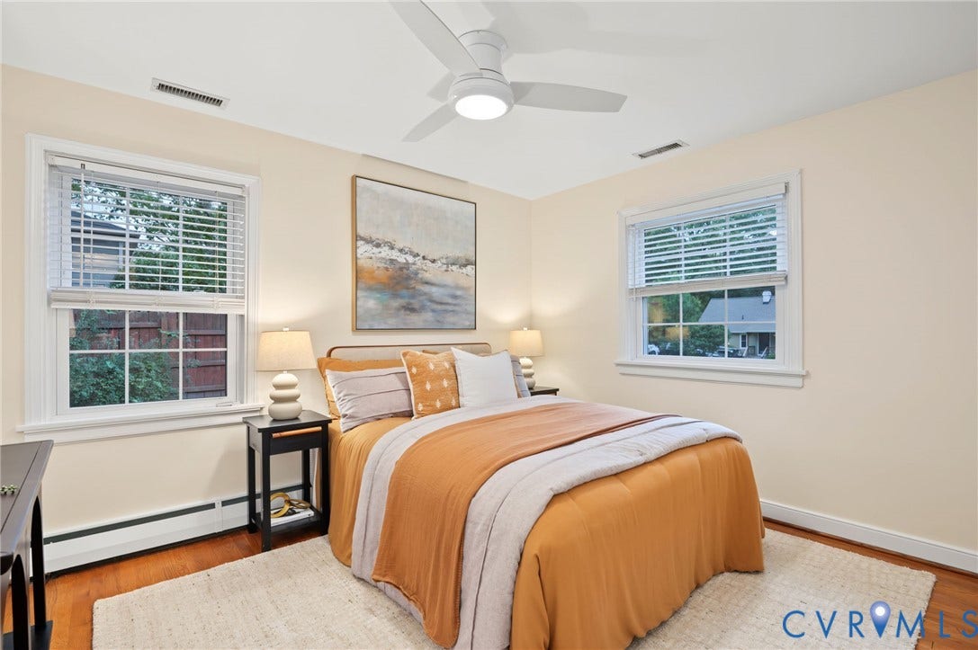 3353 Warner Road, Stratford Hills, Richmond, VA 23225 Hardwood-finish flooring, white ceiling fan, and two multi-pane windows with blinds