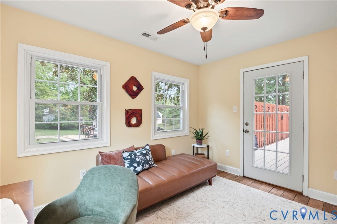 3353 Warner Road, Stratford Hills, Richmond, VA 23225 Recessed ceiling fan with integrated lighting, multiple windows providing natural illumination, wood-finish flooring, and a glass-paned exterior door