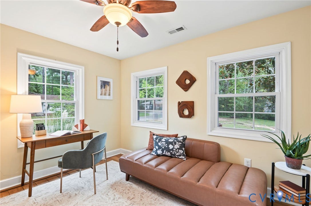 3353 Warner Road, Stratford Hills, Richmond, VA 23225 Multiple windows with white trim, wood-finish flooring, and ceiling fan with integrated lighting