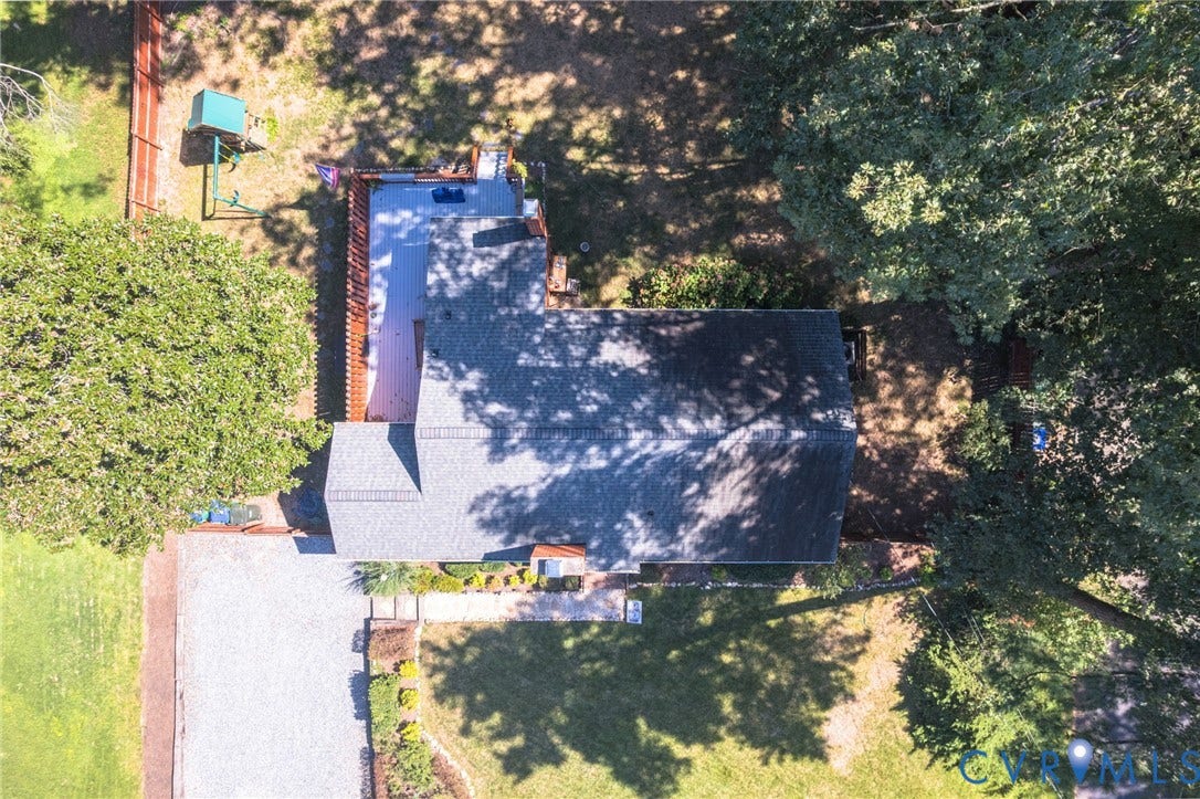 3353 Warner Road, Stratford Hills, Richmond, VA 23225 Main residence featuring a gray shingle roof, surrounded by mature trees and a gravel driveway