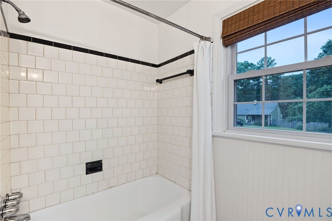 3353 Warner Road, Stratford Hills, Richmond, VA 23225 White subway tile shower surround with black accent trim