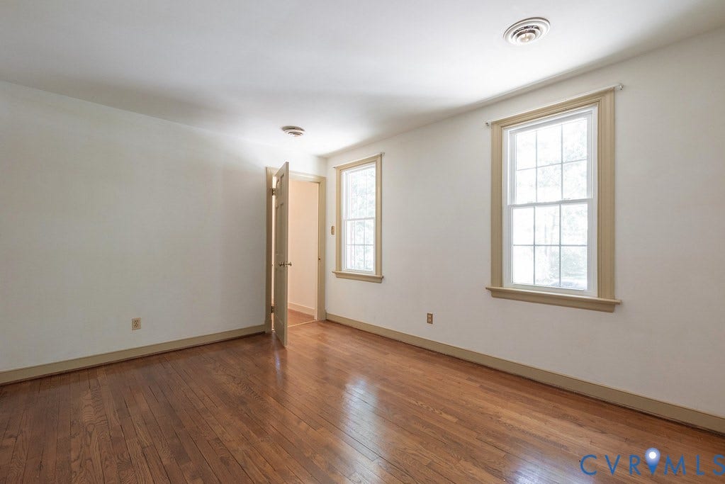 13830 Hailsham Circle, Salisbury, Midlothian, VA 23113 Hardwood flooring, painted walls, two double-hung windows, and ceiling lighting
