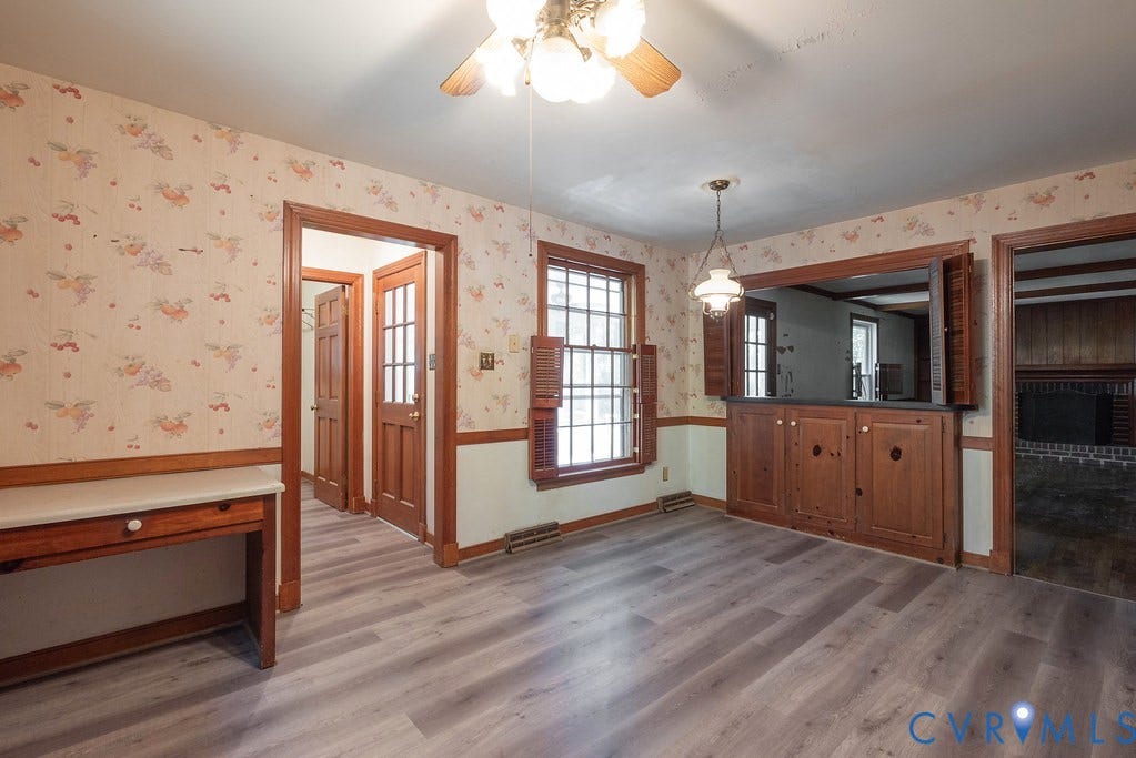 13830 Hailsham Circle, Salisbury, Midlothian, VA 23113 Wood-finish flooring throughout, built-in cabinetry with wood shutters, and wood trim detailing