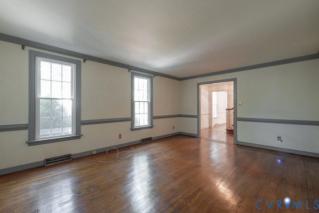 13830 Hailsham Circle, Salisbury, Midlothian, VA 23113 Hardwood flooring throughout, featuring neutral wall tones and decorative chair rail molding