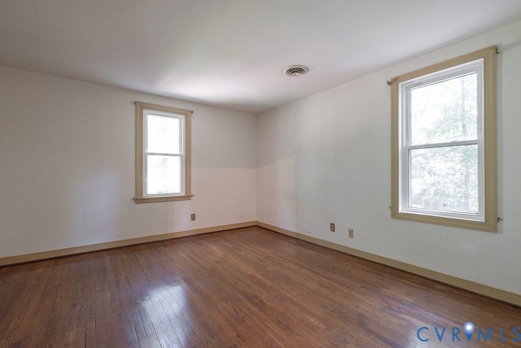 13830 Hailsham Circle, Salisbury, Midlothian, VA 23113 Hardwood flooring with neutral wall tones and two double-hung windows
