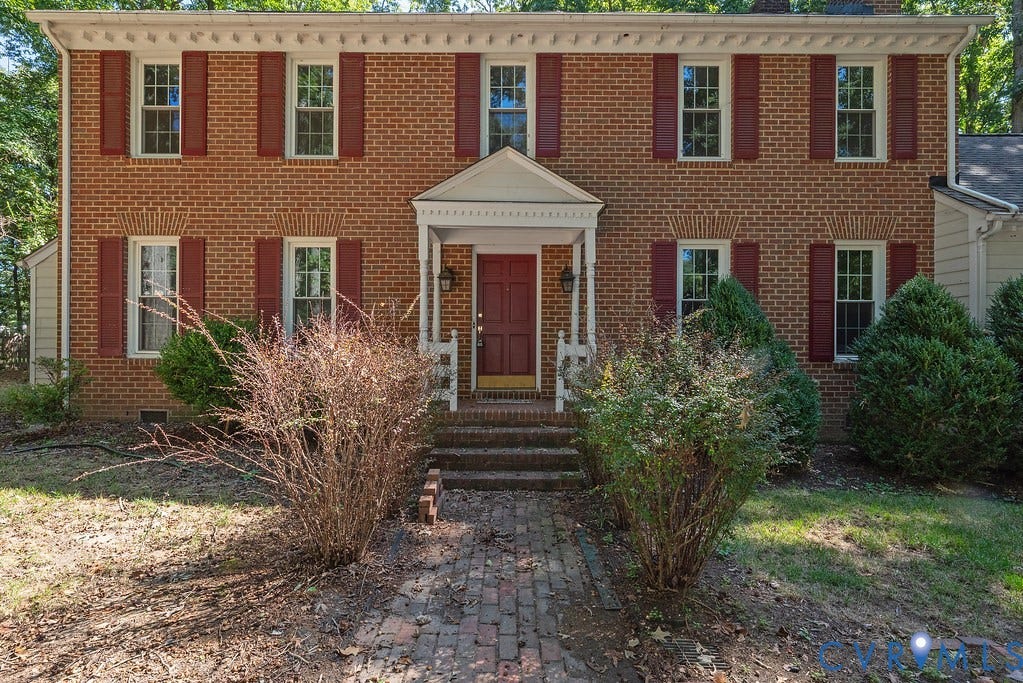 13830 Hailsham Circle, Salisbury, Midlothian, VA 23113 Brick exterior with white window trim and red shutters
