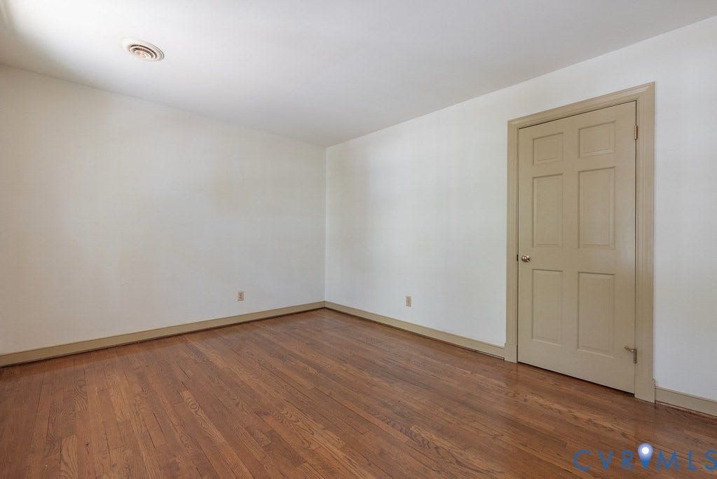 13830 Hailsham Circle, Salisbury, Midlothian, VA 23113 Hardwood flooring, painted interior door, neutral wall color, and ceiling-mounted air vent