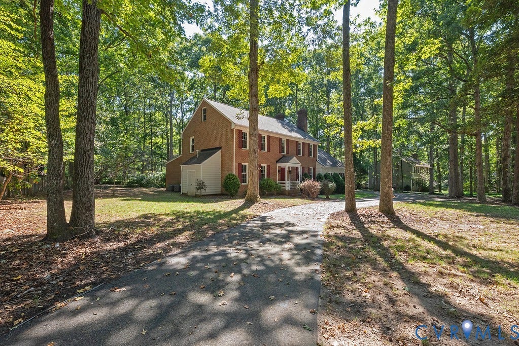 13830 Hailsham Circle, Salisbury, Midlothian, VA 23113 Brick exterior with white trim, arched portico, and red shutters