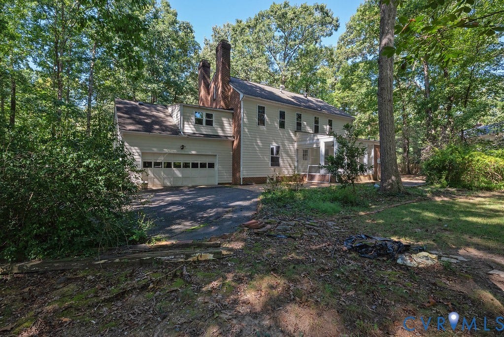 13830 Hailsham Circle, Salisbury, Midlothian, VA 23113 Two-story siding exterior with multiple windows, attached two-car garage, and prominent brick chimney