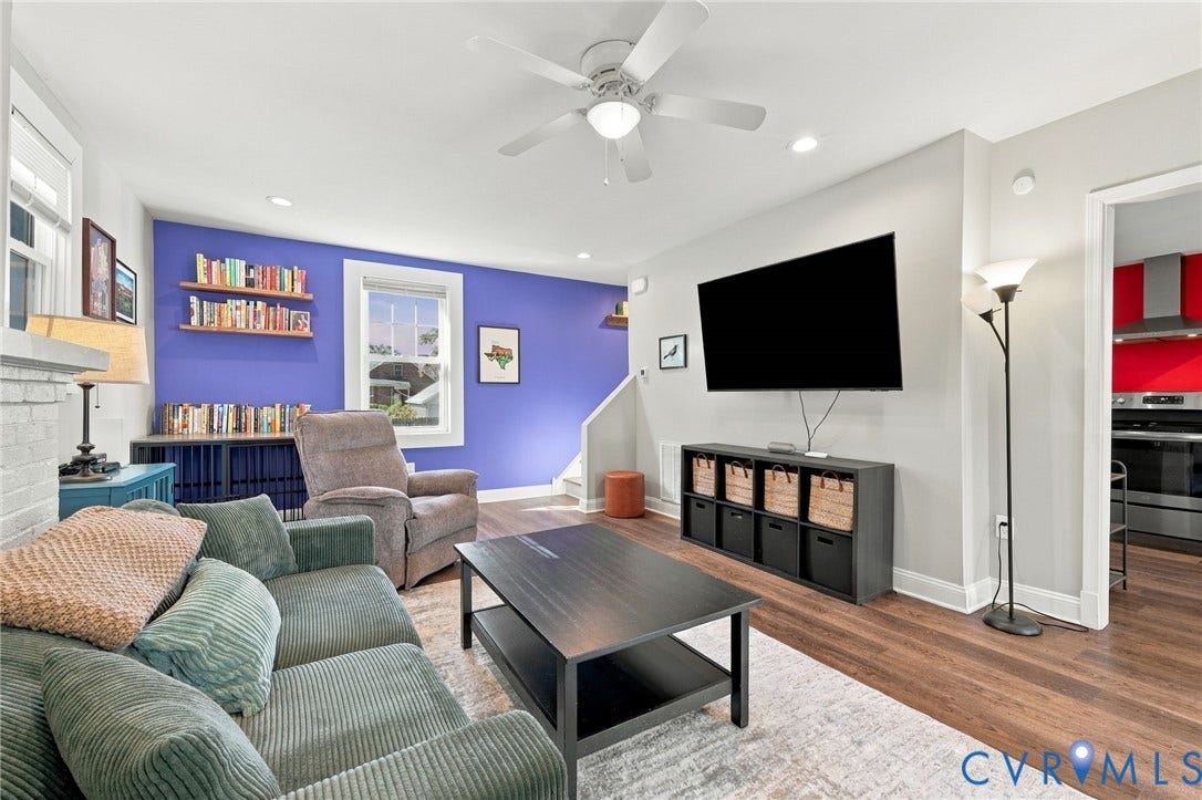3504 Delaware Avenue, Richmond, VA 23222 Open-concept living area featuring wood-finish flooring, recessed lighting, a ceiling fan, and built-in shelving