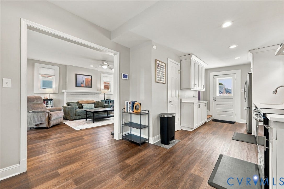 3504 Delaware Avenue, Richmond, VA 23222 Open concept main floor featuring wood-finish flooring, recessed lighting, and white cabinetry