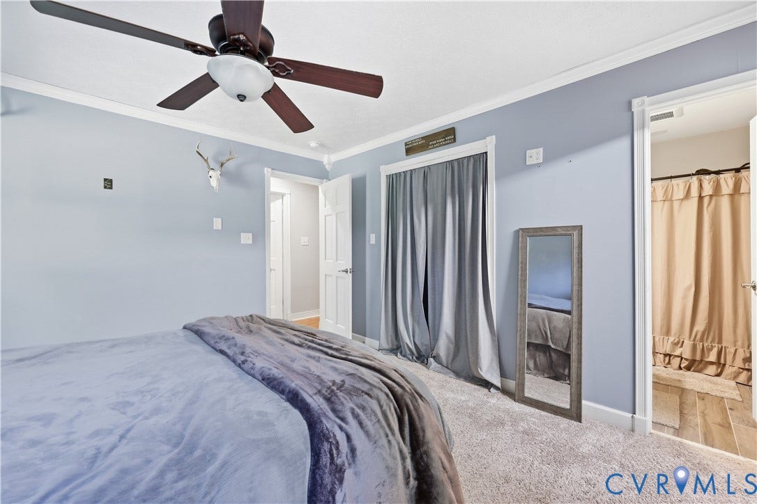 Carpeted flooring complemented by light blue walls