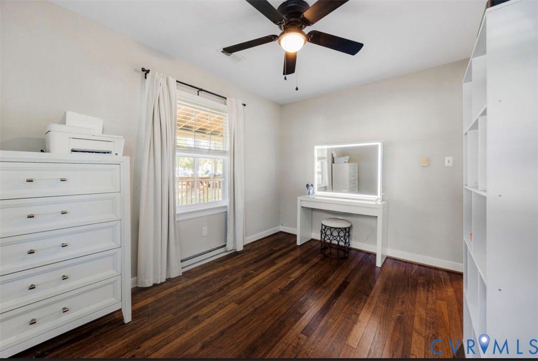 Hardwood-finish flooring, ceiling fan with light fixture, and window with natural light