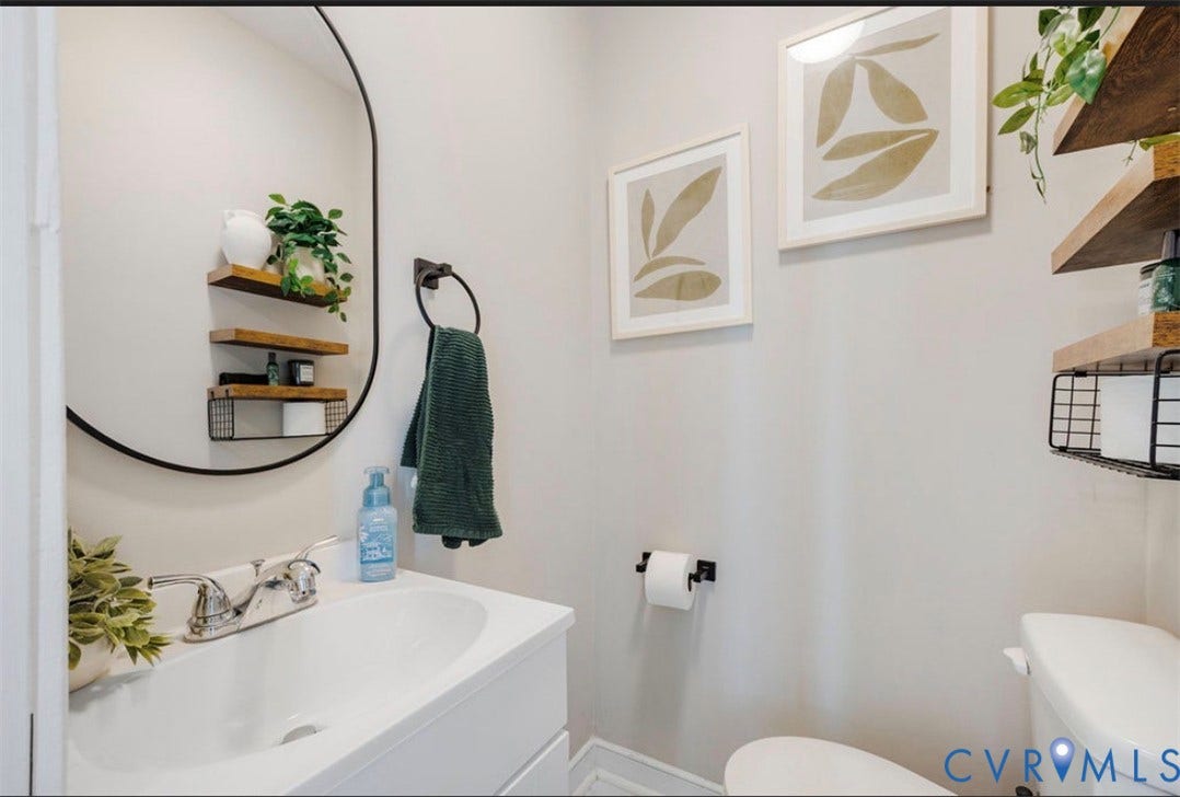 White vanity with integrated sink