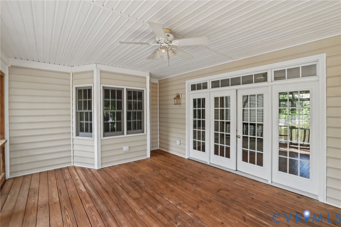 3600 Rivermist Terrace, Midlothian, VA 23113 Spacious screened porch featuring wood-finish flooring, bay windows, and a ceiling fan