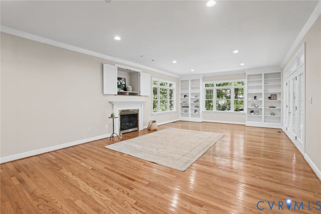 3600 Rivermist Terrace, Midlothian, VA 23113 Hardwood flooring, recessed lighting, built-in shelving, a fireplace with a mantel, and French doors