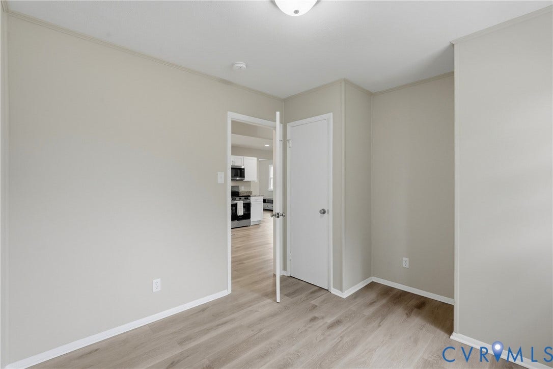 1814 Aeronca Avenue, Henrico, VA 23228 Wood-finish flooring, neutral wall tones, and overhead lighting