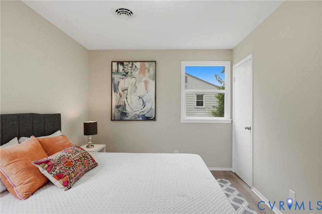 1814 Aeronca Avenue, Henrico, VA 23228 Neutral wall finishes, white trim, recessed ceiling vent, window with white frame, and wood-finish flooring