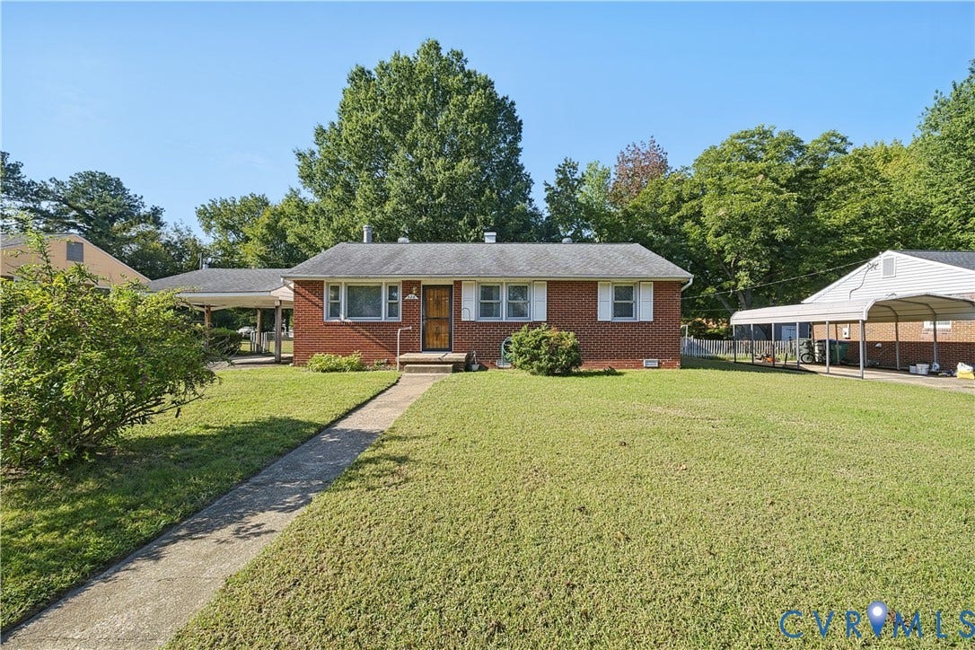 528 Duffton Road, Richmond, VA 23225 Brick exterior with white window shutters and a gabled roof
