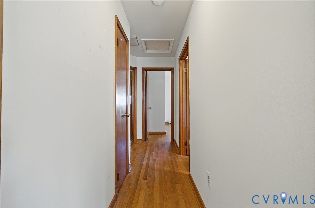 528 Duffton Road, Richmond, VA 23225 Hardwood flooring throughout, white painted walls, and wood interior doors