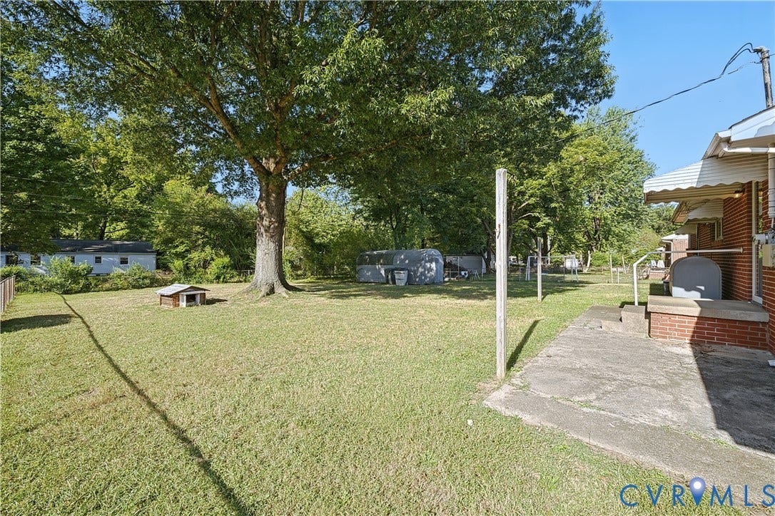 528 Duffton Road, Richmond, VA 23225 Expansive grassy yard with mature trees