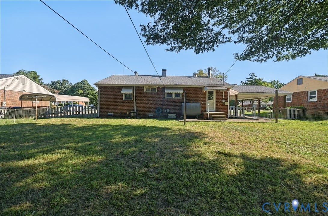 528 Duffton Road, Richmond, VA 23225 Brick exterior with a covered patio, rear entry, and a fenced area