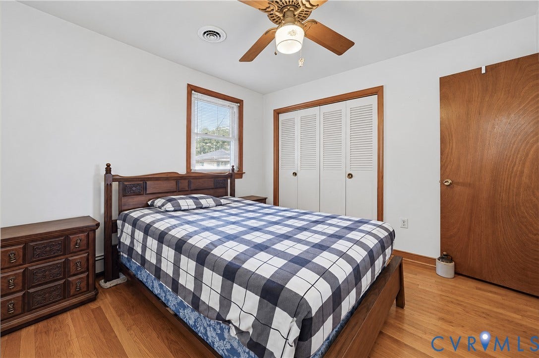 528 Duffton Road, Richmond, VA 23225 Hardwood flooring with white walls and wood trim