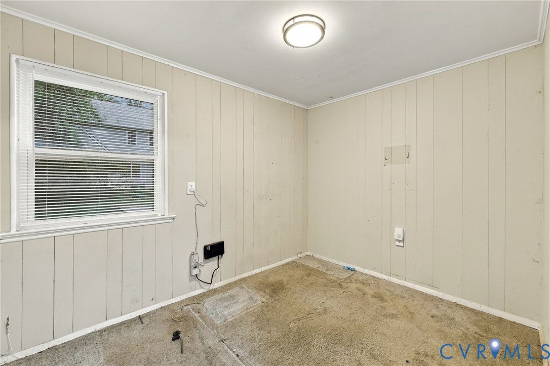 3238 E Weyburn Road, Bon Air, Richmond, VA 23235 Recessed window with blinds, vertical paneling, and a flush mount ceiling light fixture