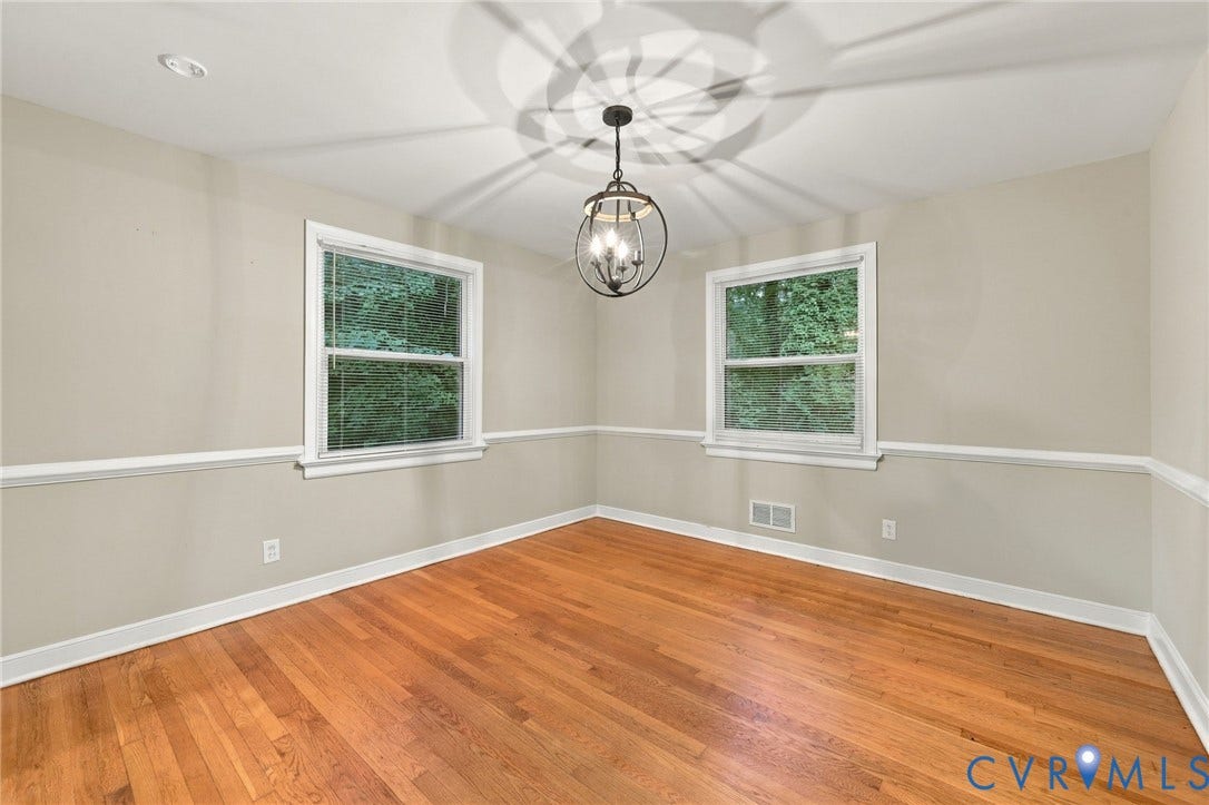 3238 E Weyburn Road, Bon Air, Richmond, VA 23235 Hardwood flooring, two windows, recessed lighting, chair rail molding, and a drum pendant light fixture