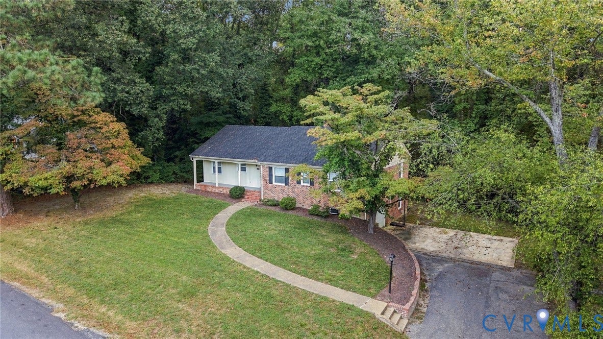 3238 E Weyburn Road, Bon Air, Richmond, VA 23235 Brick exterior with dark shutters, covered front porch, and a paved driveway