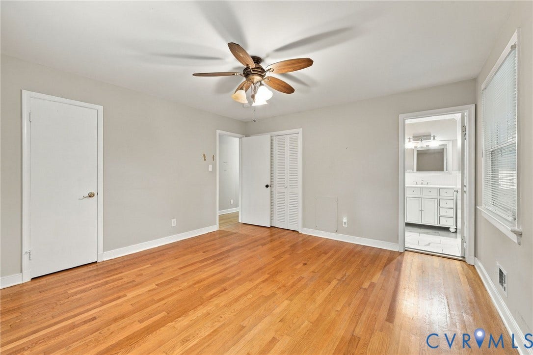 3238 E Weyburn Road, Bon Air, Richmond, VA 23235 Wood-finish flooring, ceiling fan with integrated lighting, white interior doors, and a window with blinds