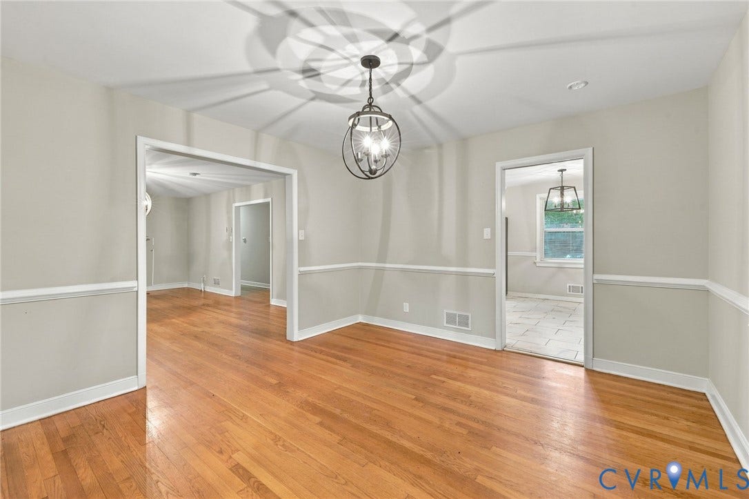 3238 E Weyburn Road, Bon Air, Richmond, VA 23235 Hardwood flooring, painted wainscoting, recessed lighting, and a decorative pendant light fixture
