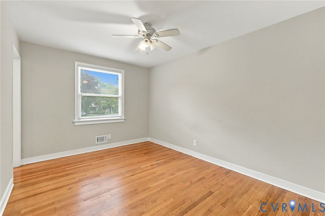 3238 E Weyburn Road, Bon Air, Richmond, VA 23235 Hardwood flooring, neutral wall tones, white trim, ceiling fan, and a bright window